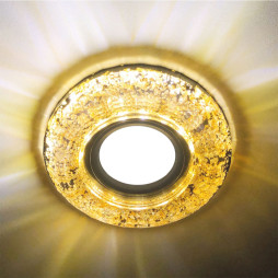 Built-in luminaire Feron CD830 under a lamp with backlight black gold