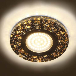 Built-in luminaire Feron 8585-2 under a lamp with backlight black gold